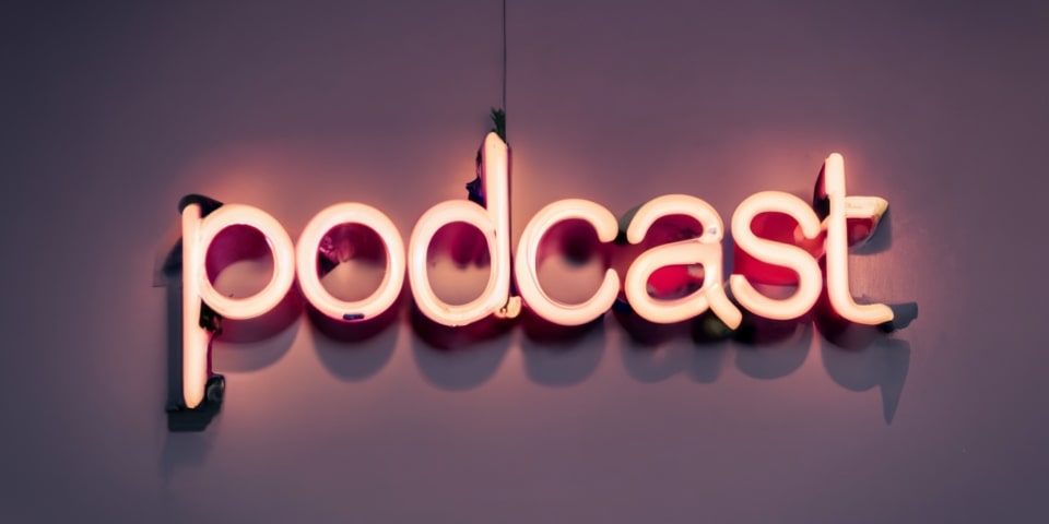 A Neon sign stating the word: "Podcast".